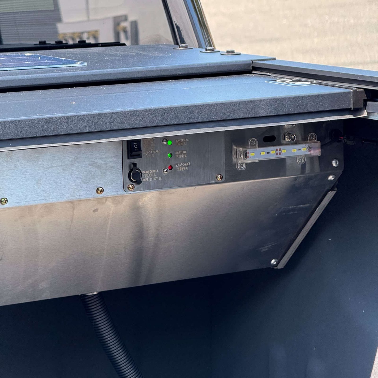 Solar powered electric truck bed cover