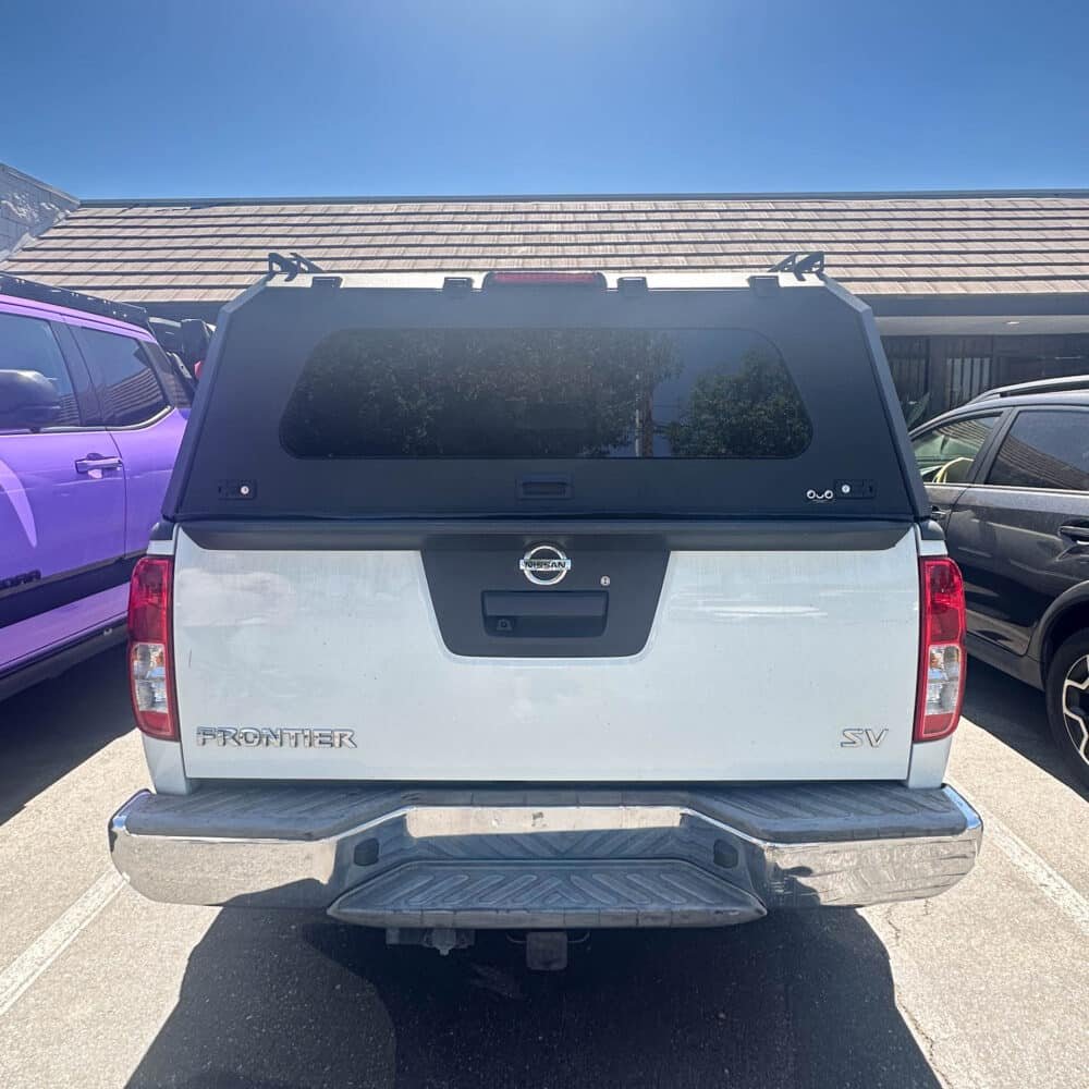 Nissan Frontier 5ft Aluminum Camper Shell by OuO Pickup Cover